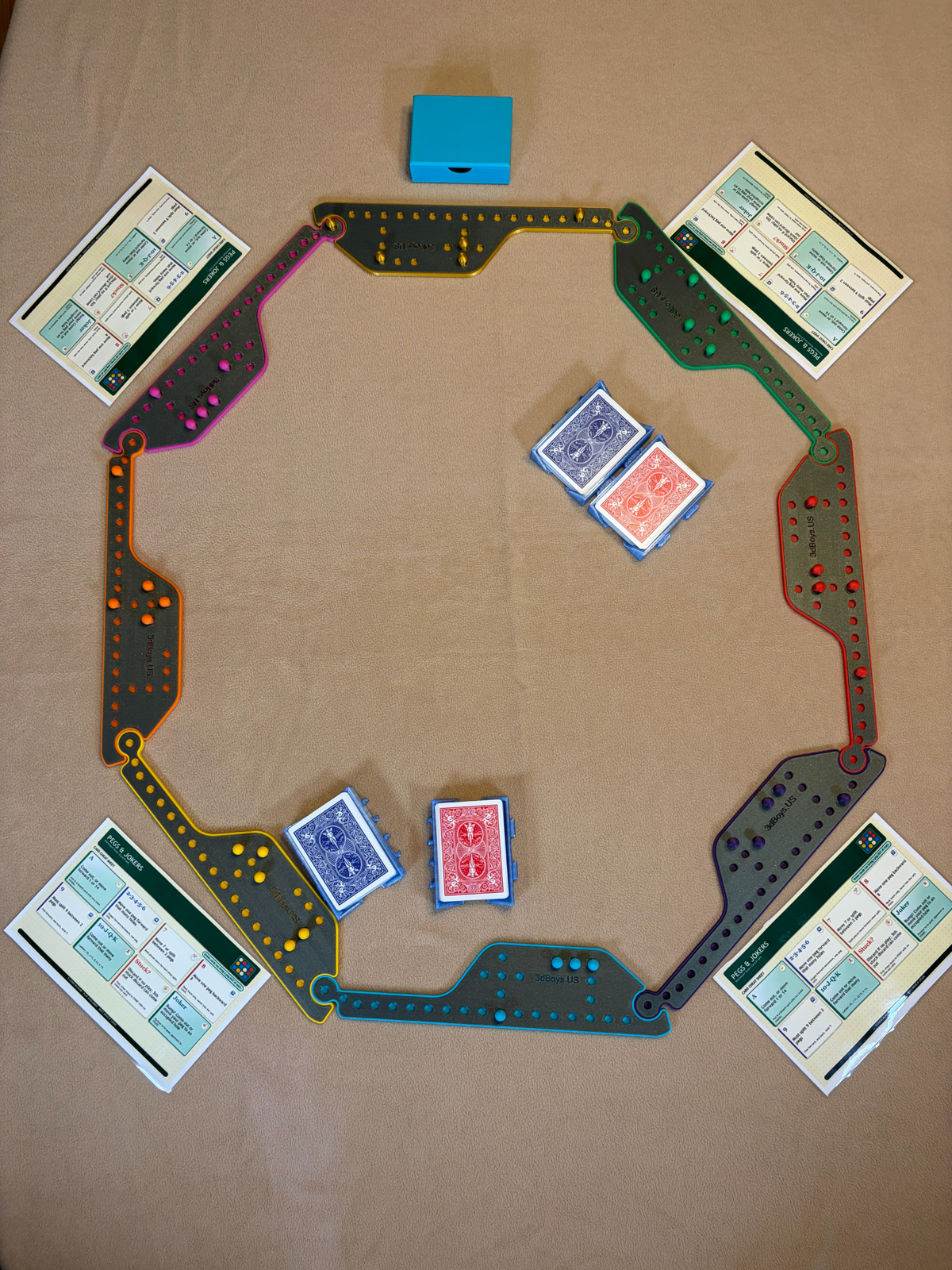 Pegs & Jokers game board with cards and colored pegs